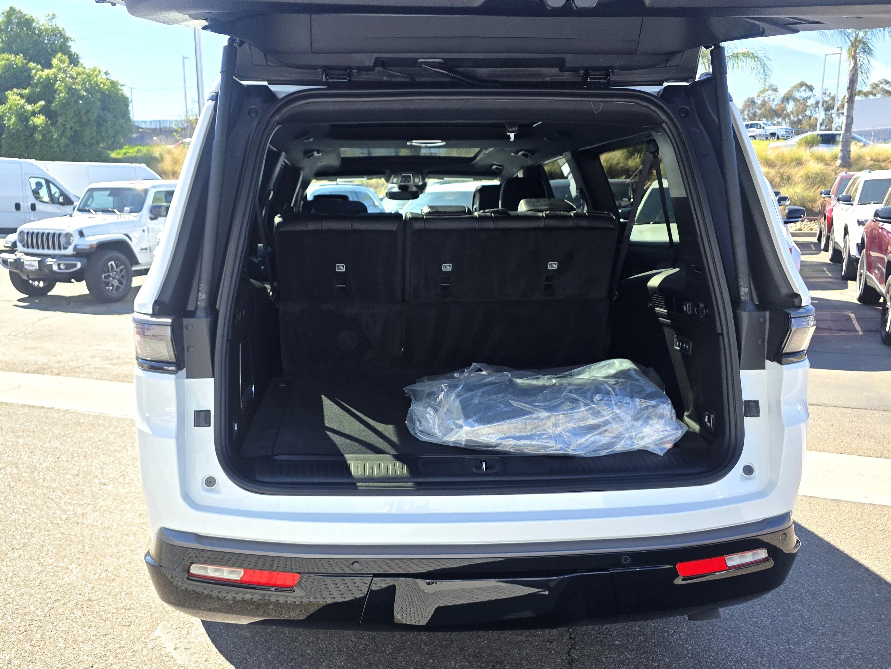 New 2026 Bright White Clearcoat Jeep Limited Altitude image 23