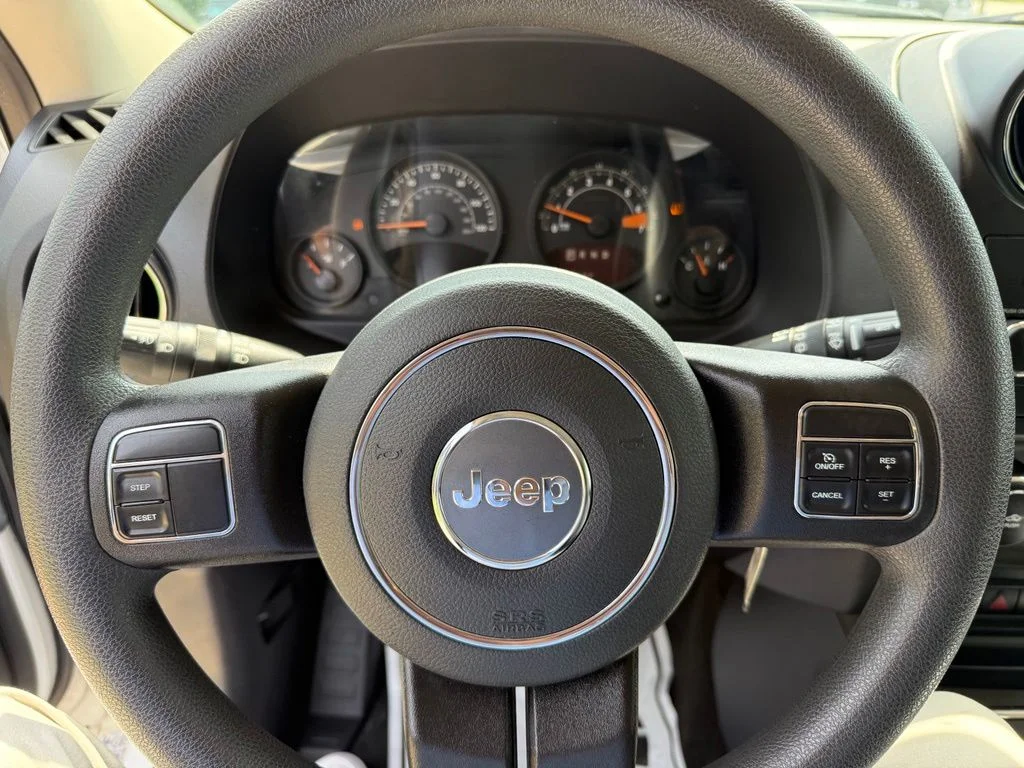 Used 2015 White Jeep Sport image 13