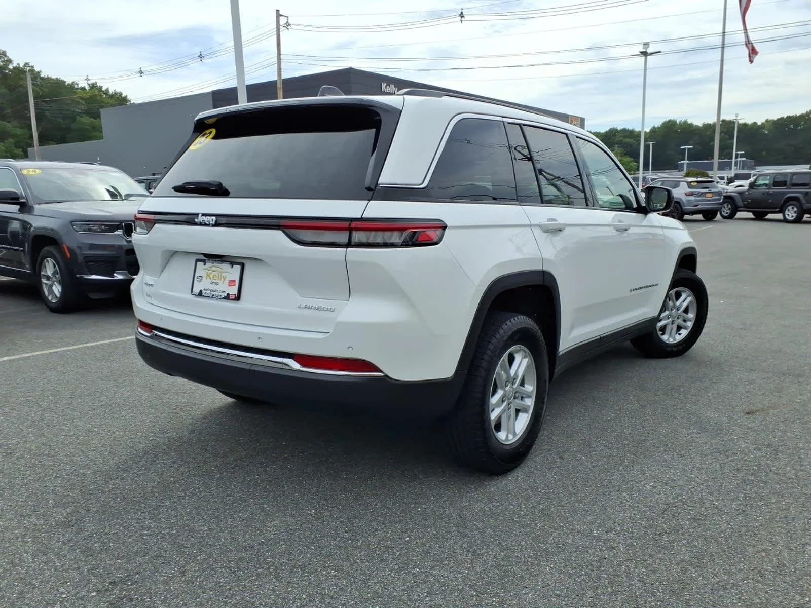 Used 2023 Bright White Clearcoat Jeep Laredo image 7