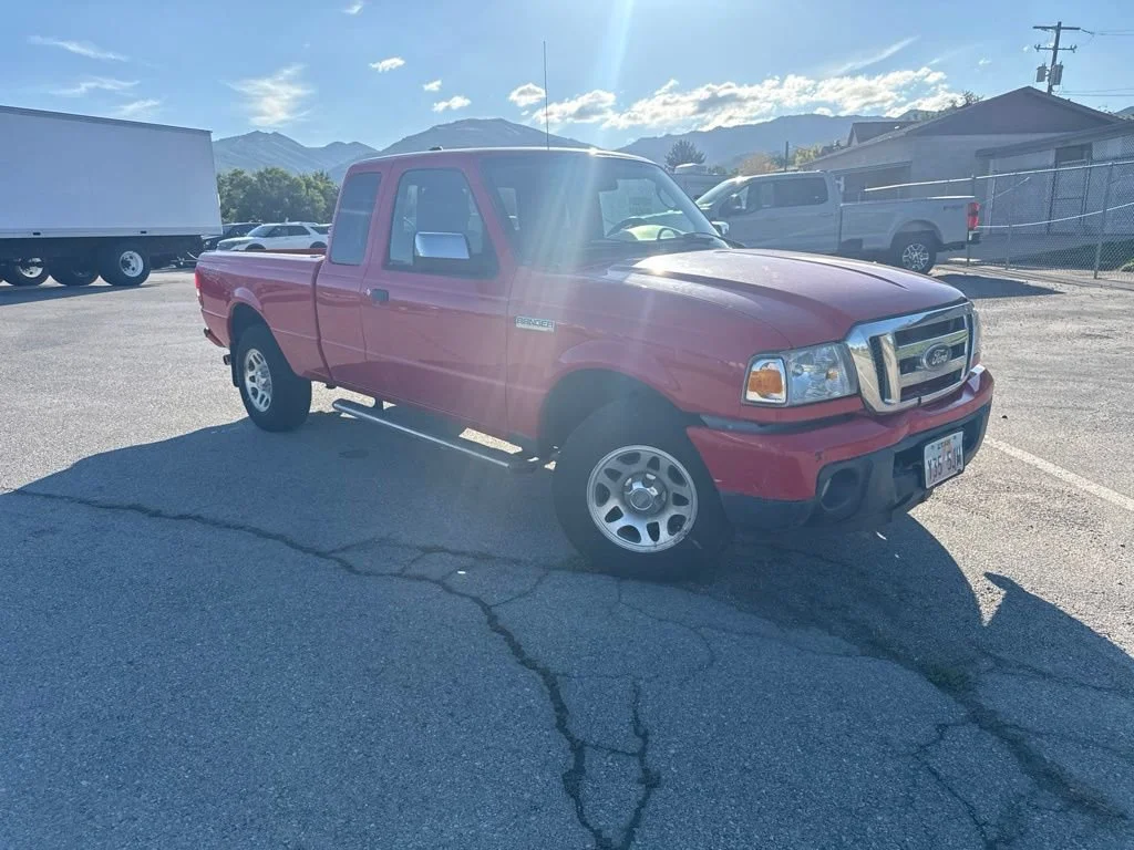Used 2011 Torch Red Ford XLT image 1