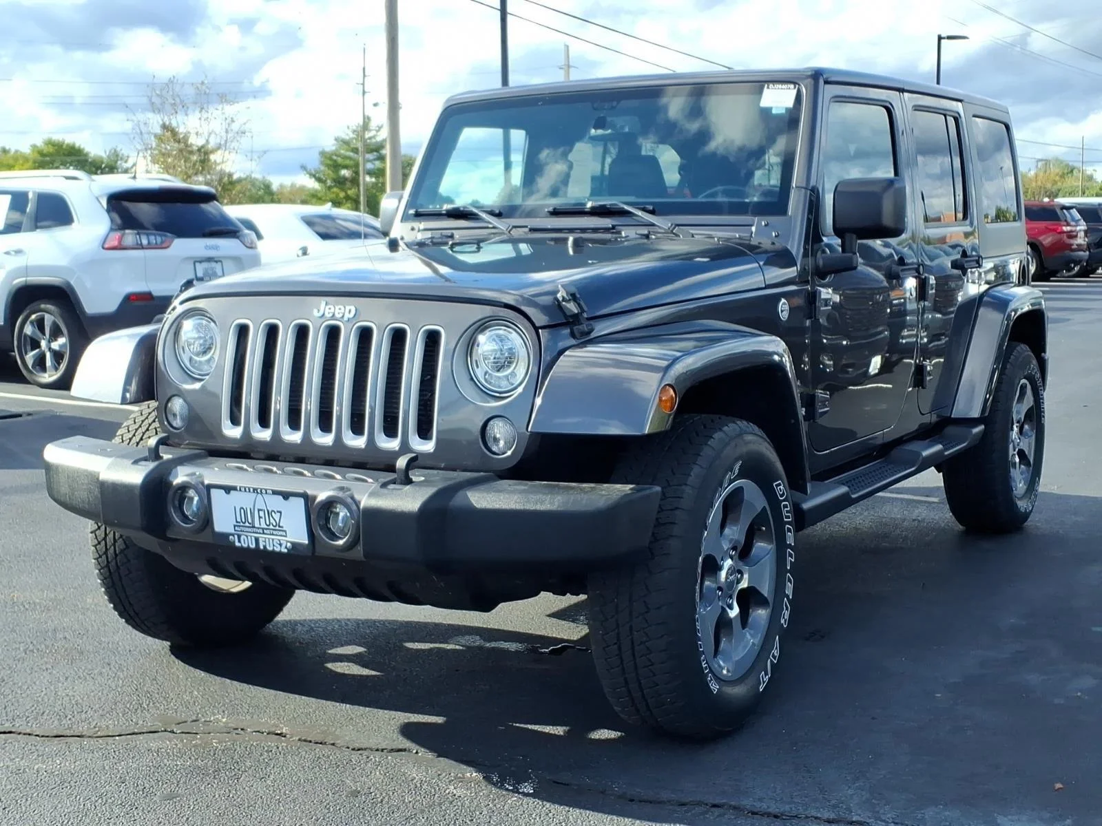 Used 2017 Granite Crystal Metallic Clearcoat Jeep Sahara image 2