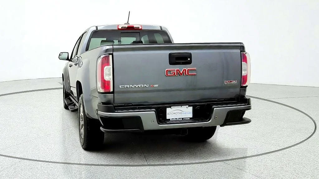 Used 2019 Satin Steel Metallic GMC 4WD Crew Cab 128.3