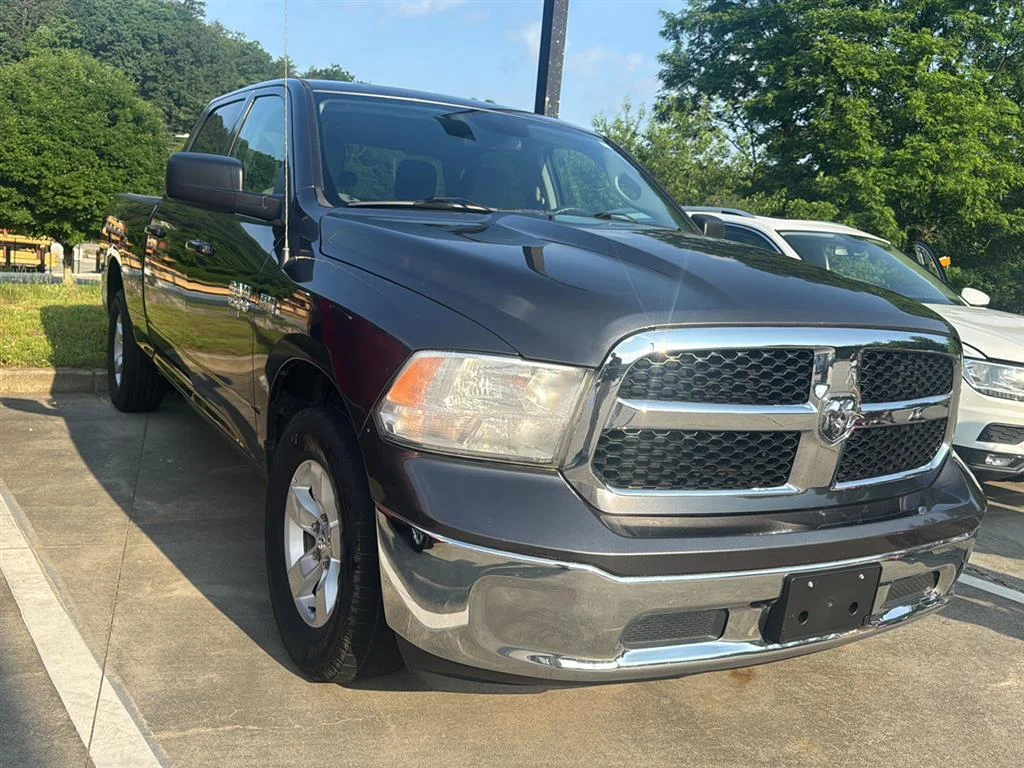 Used 2021 Granite Crystal Metallic Clearcoat Ram SLT image 1
