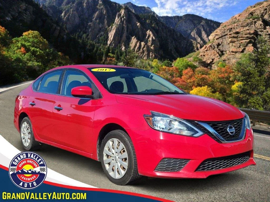 Used 2017 Red Alert Nissan SV image 1