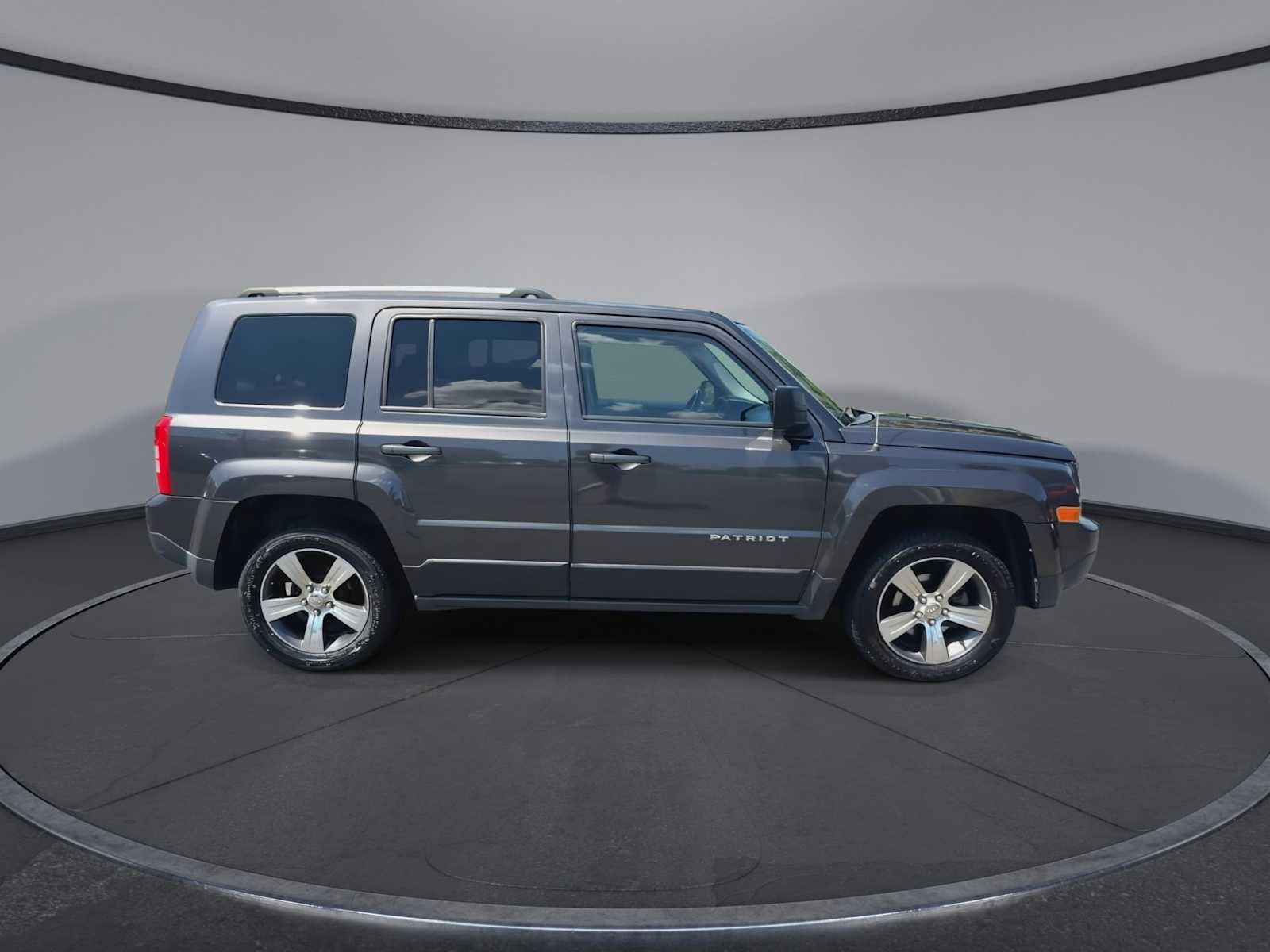 Used 2016 Granite Crystal Metallic Clearcoat Jeep High Altitude Edition image 9