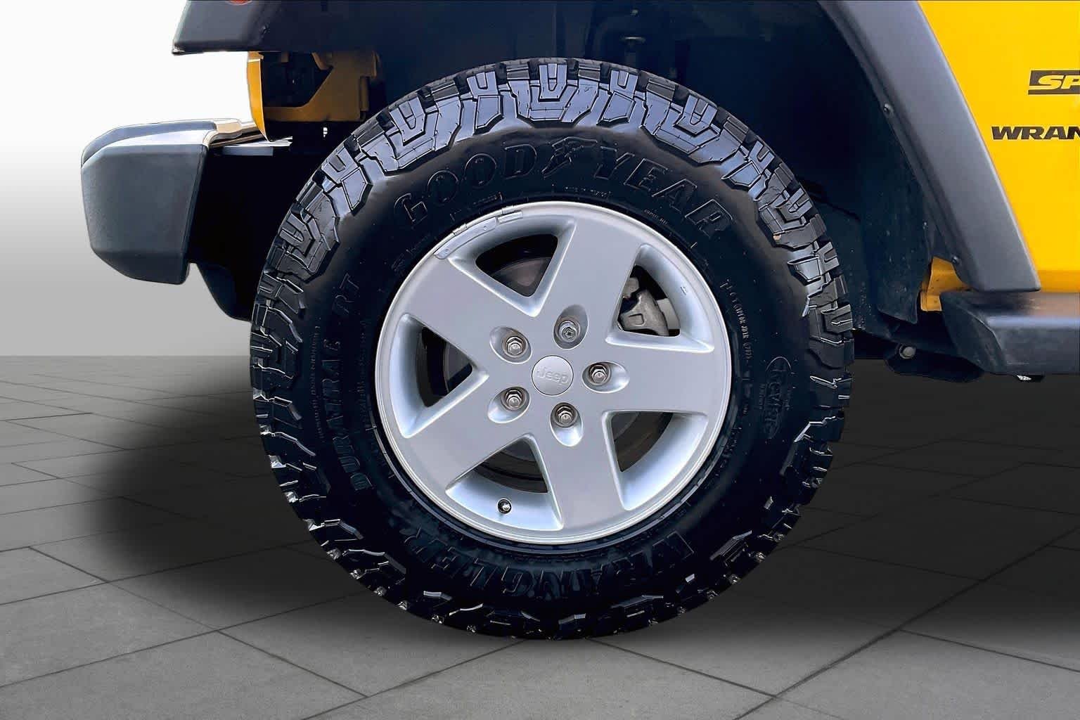 Used 2015 Baja Yellow Clearcoat Jeep Sport image 11