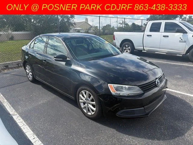 Used 2011 Black Volkswagen 2.5L SE image 1