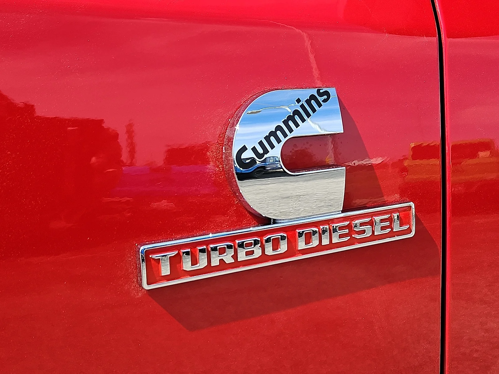 New 2026 Flame Red Ram LONE STAR CREW CAB 4X4 6