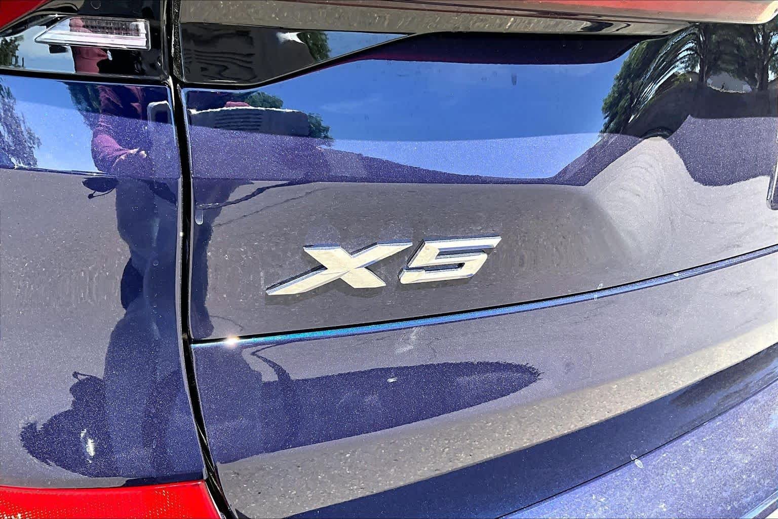 New 2026 Tanzanite Blue II Metallic BMW xDrive50e image 15