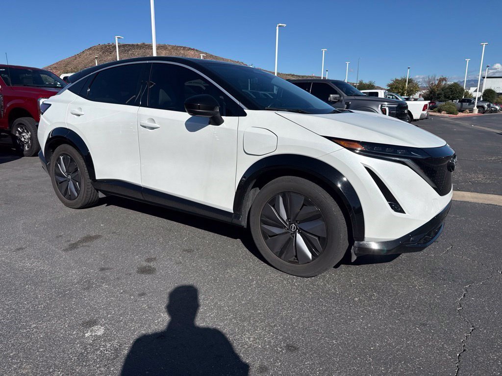 Used 2023 Everest White Pearl Tricoat/Black Diamond Pearl Nissan EVOLVE+ image 2