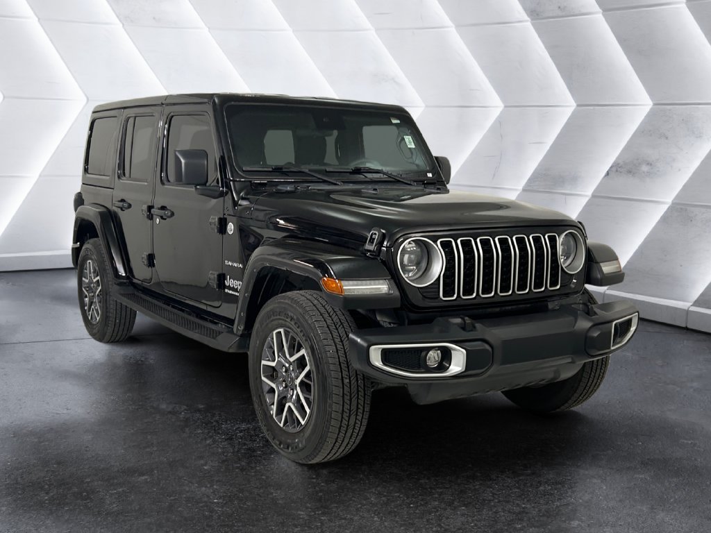 Used 2024 Black Jeep Sahara image 1
