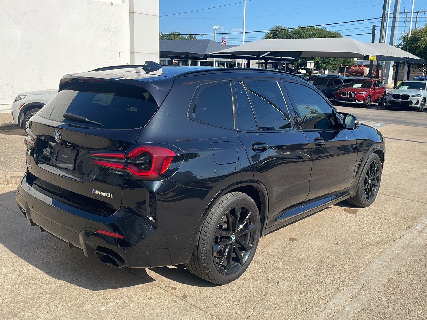Certified Used 2023 Black Sapphire Metallic BMW M40i image 2