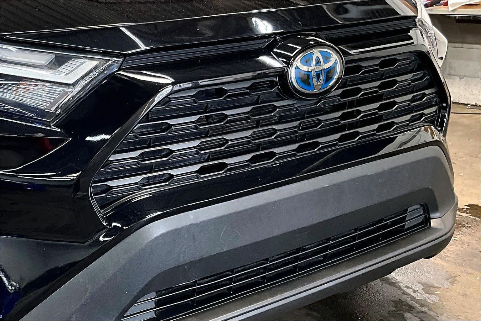 Used 2024 Midnight Black Metallic Toyota Hybrid LE image 29