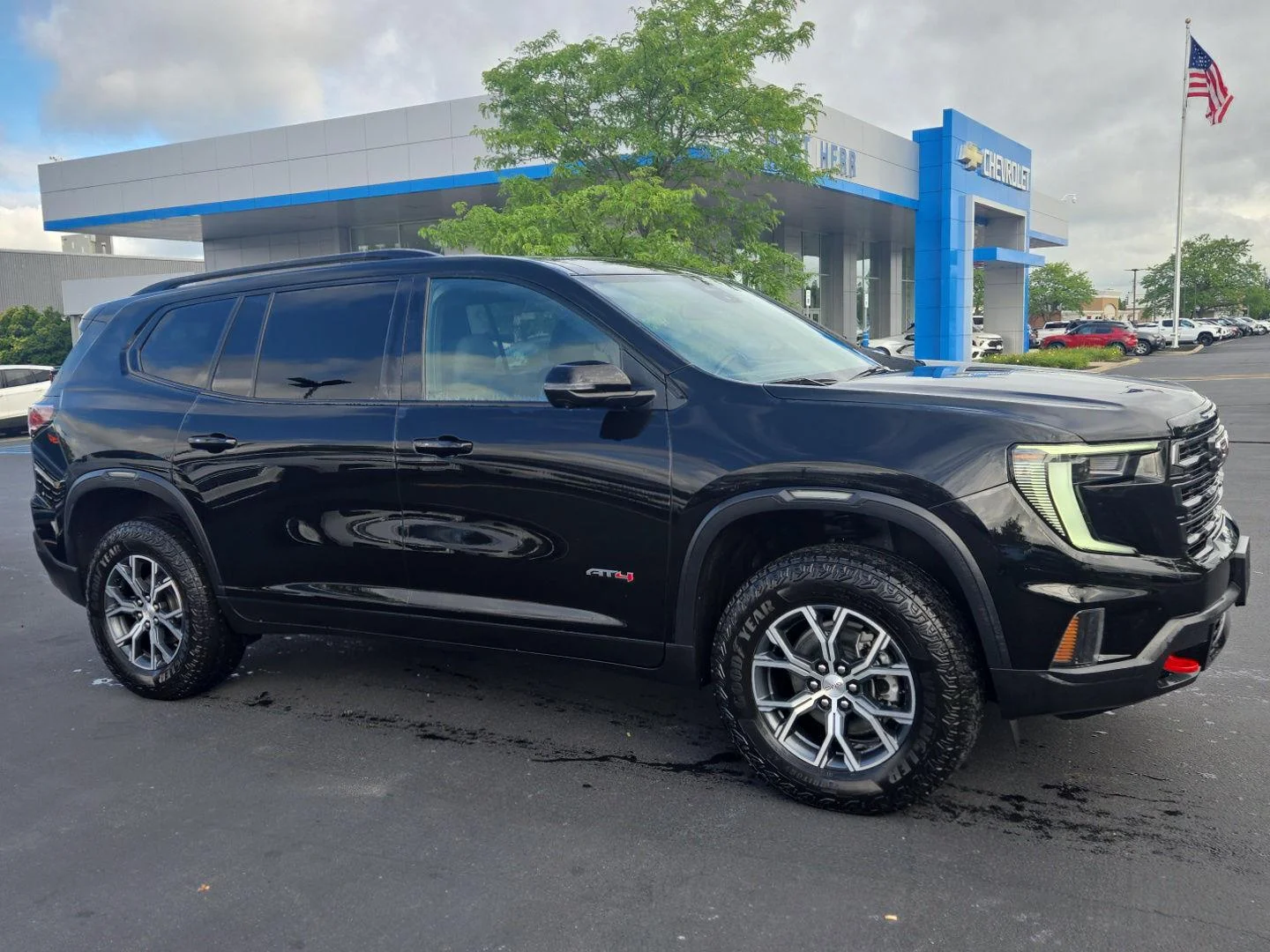 Used 2025 Ebony Twilight Metallic GMC AWD AT4 image 1