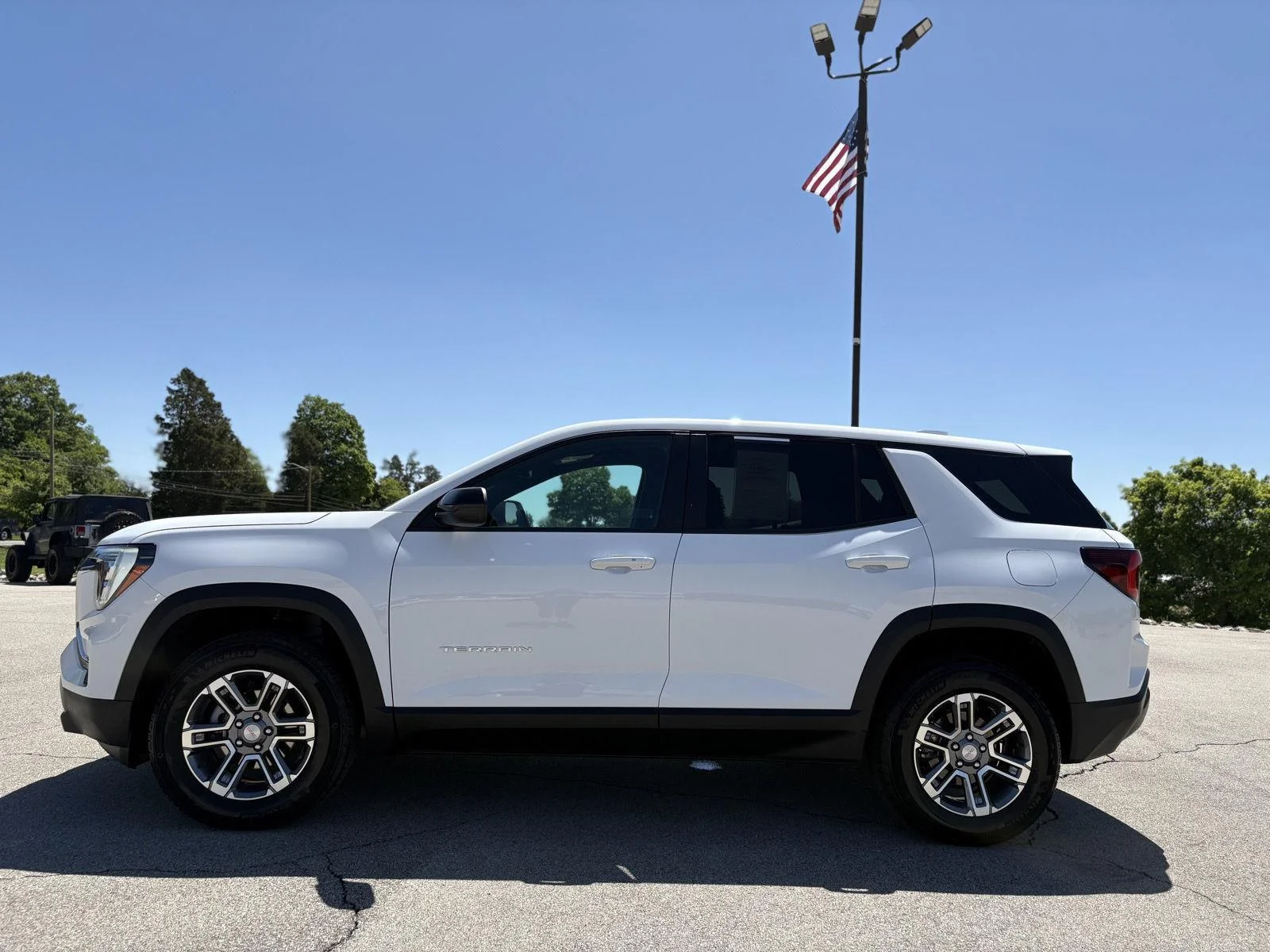 Used 2026 Summit White GMC FWD Elevation image 3