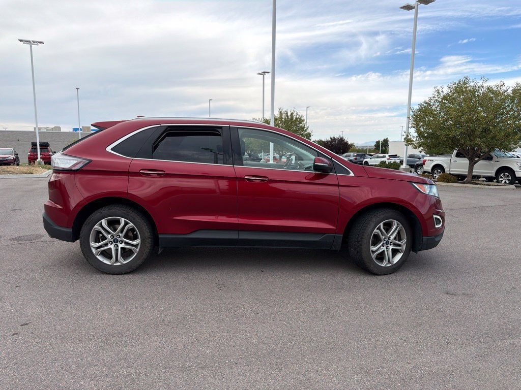 Used 2016 Ruby Red Metallic Ford Titanium image 4