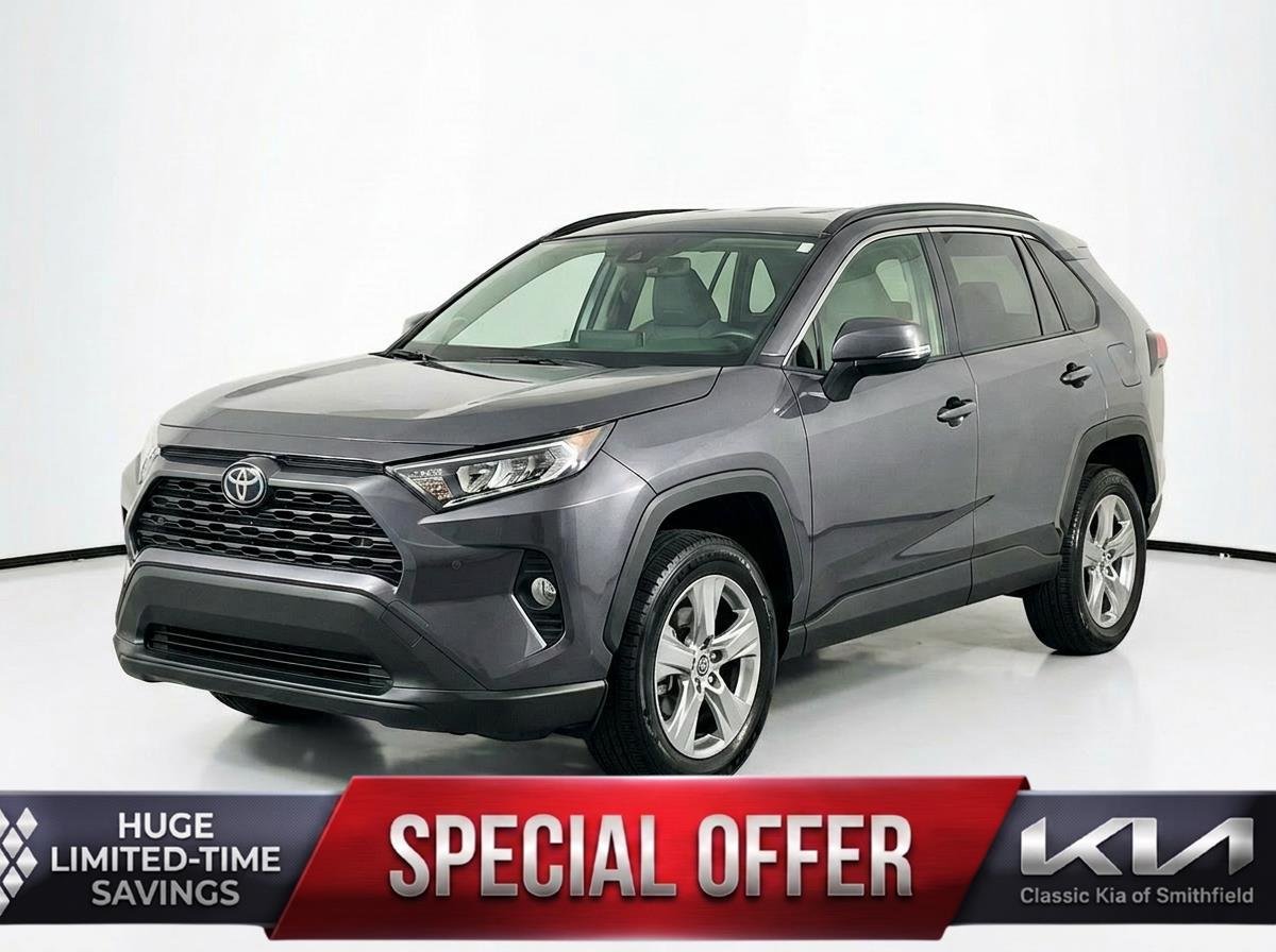 Used 2024 Magnetic Gray Metallic Toyota XLE image 1
