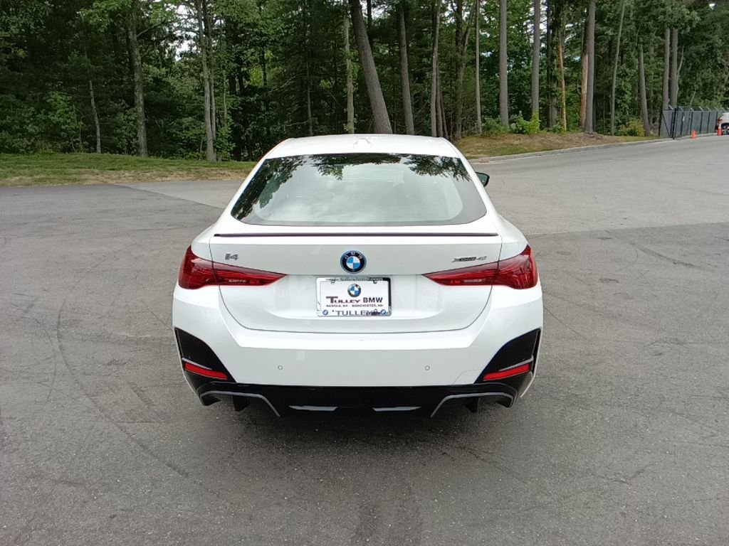 Certified Used 2025 Mineral White Metallic BMW xDrive40 image 6