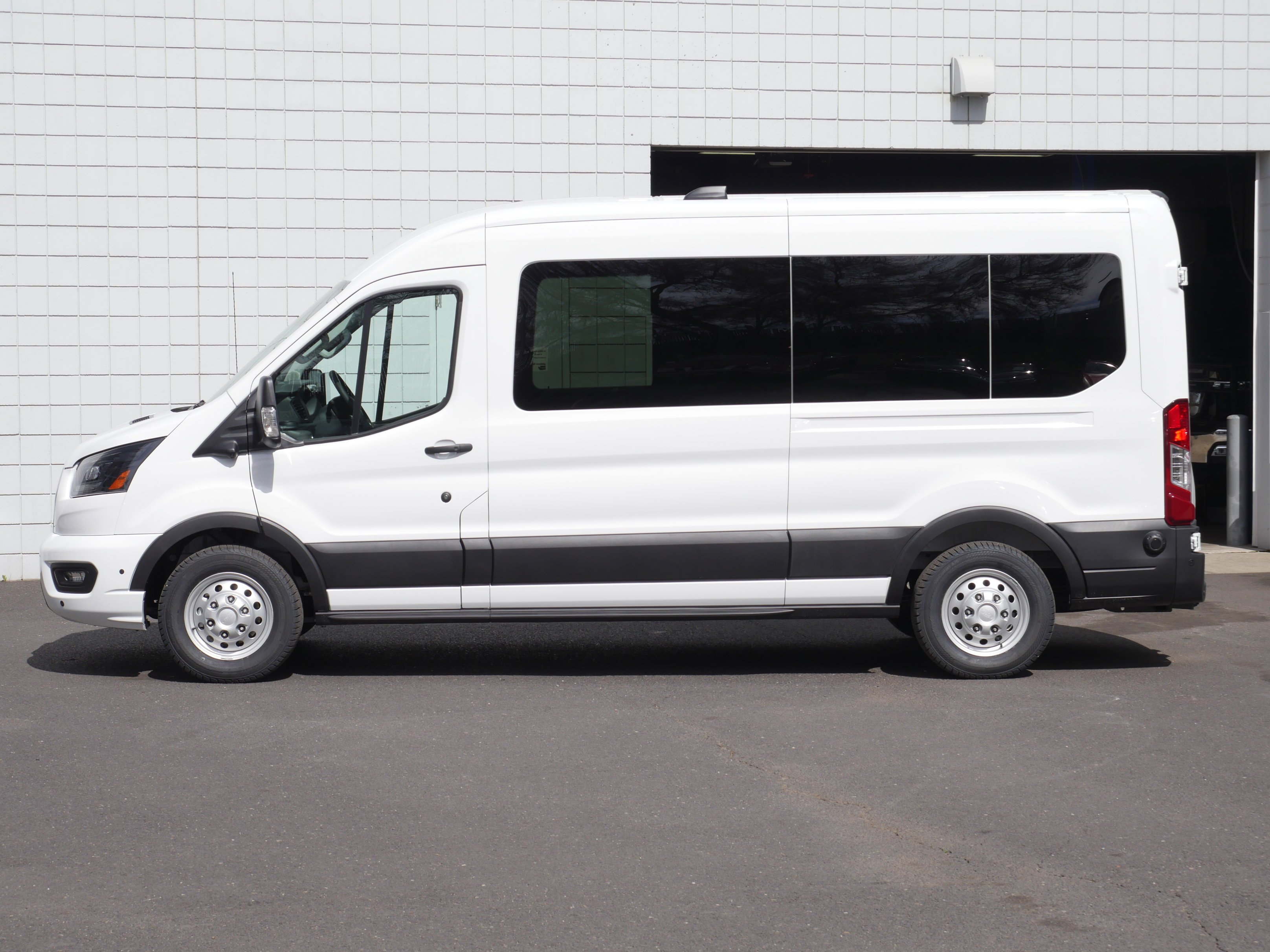 New 2026 Oxford White Ford Passenger Van XLT image 15