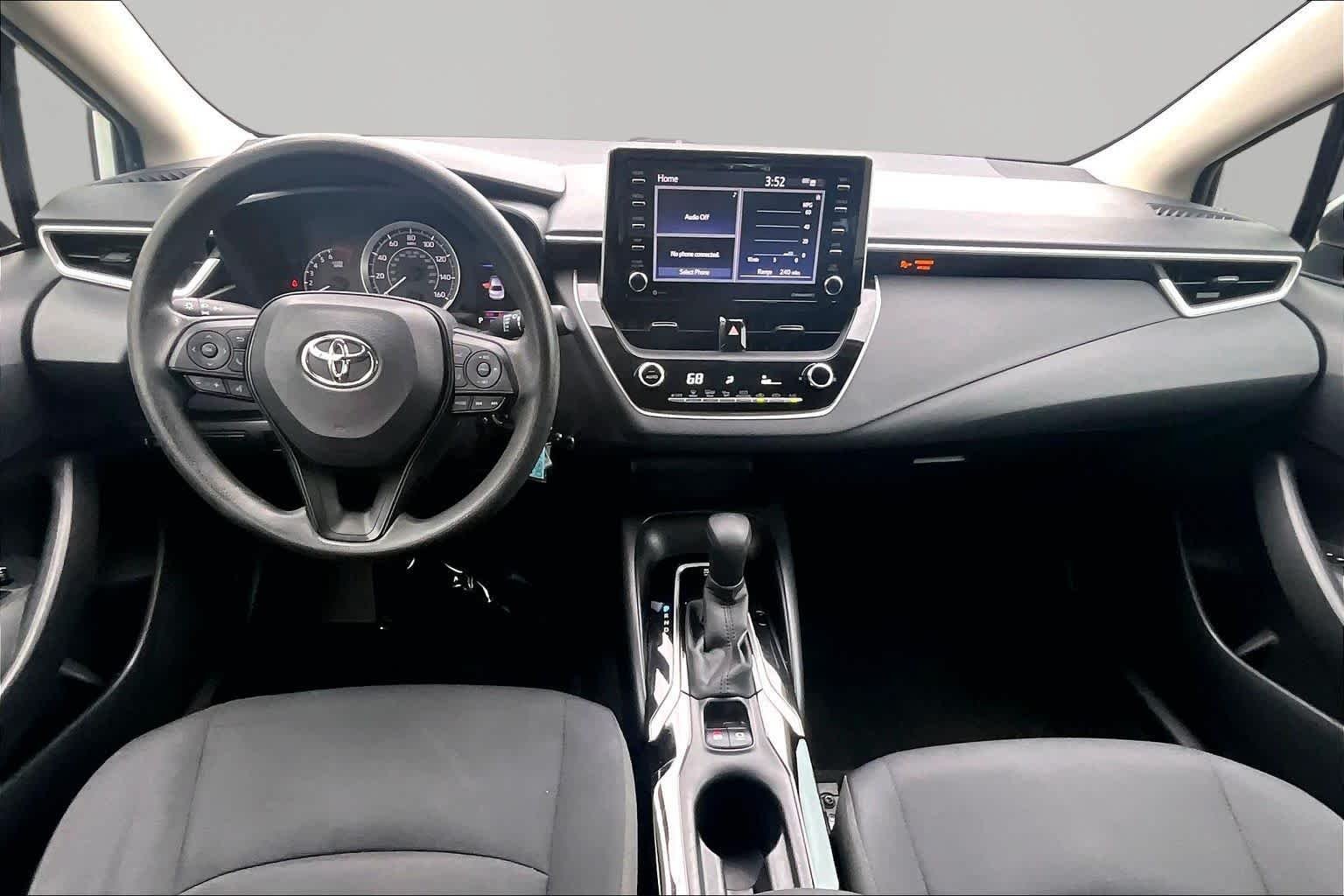Used 2021 Super White Toyota LE image 16