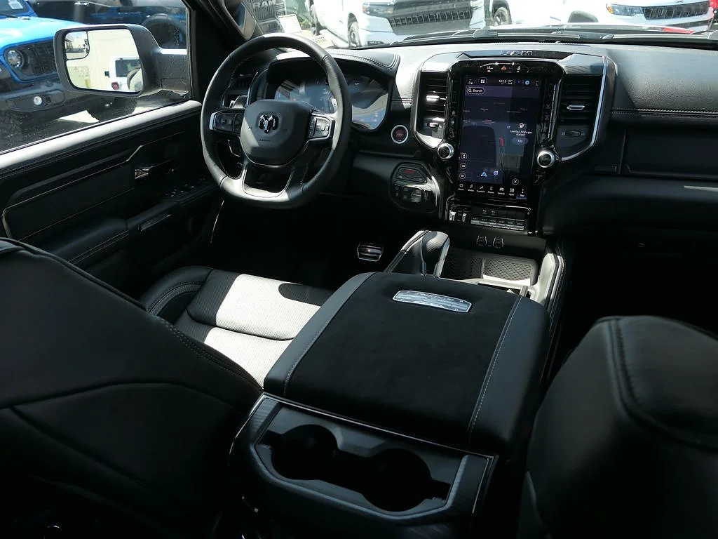 New 2026 Diamond Black Crystal Pearl Coat RAM RHO Crew Cab 4x4 5