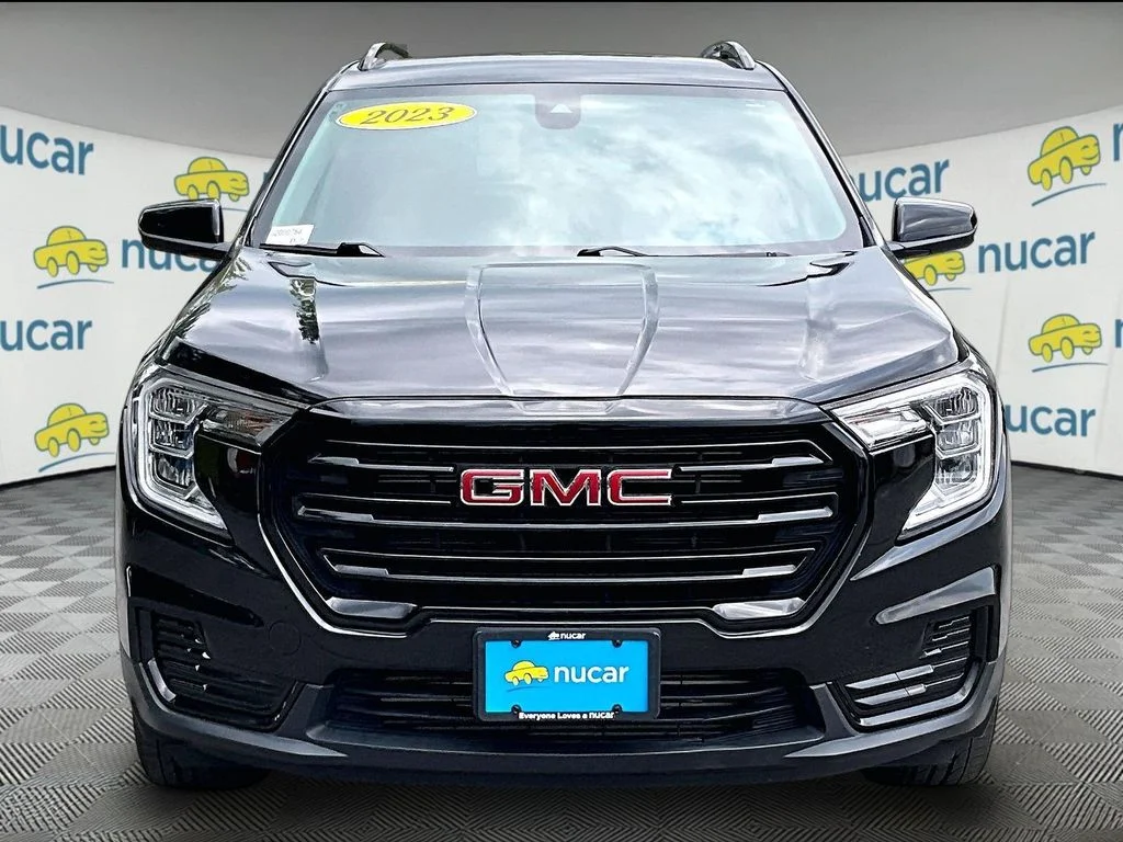 Used 2023 Ebony Twilight Metallic GMC SLE image 2