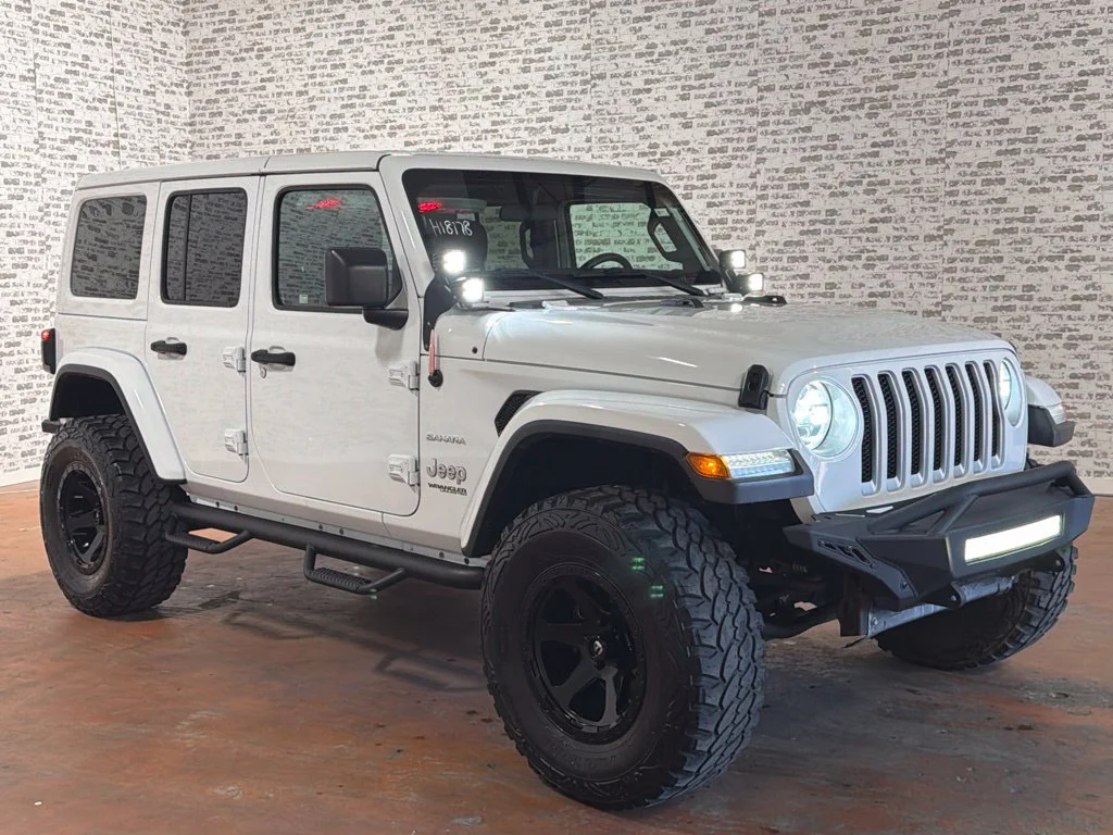 Used 2019 Bright White Clearcoat Jeep Unlimited Sahara image 1