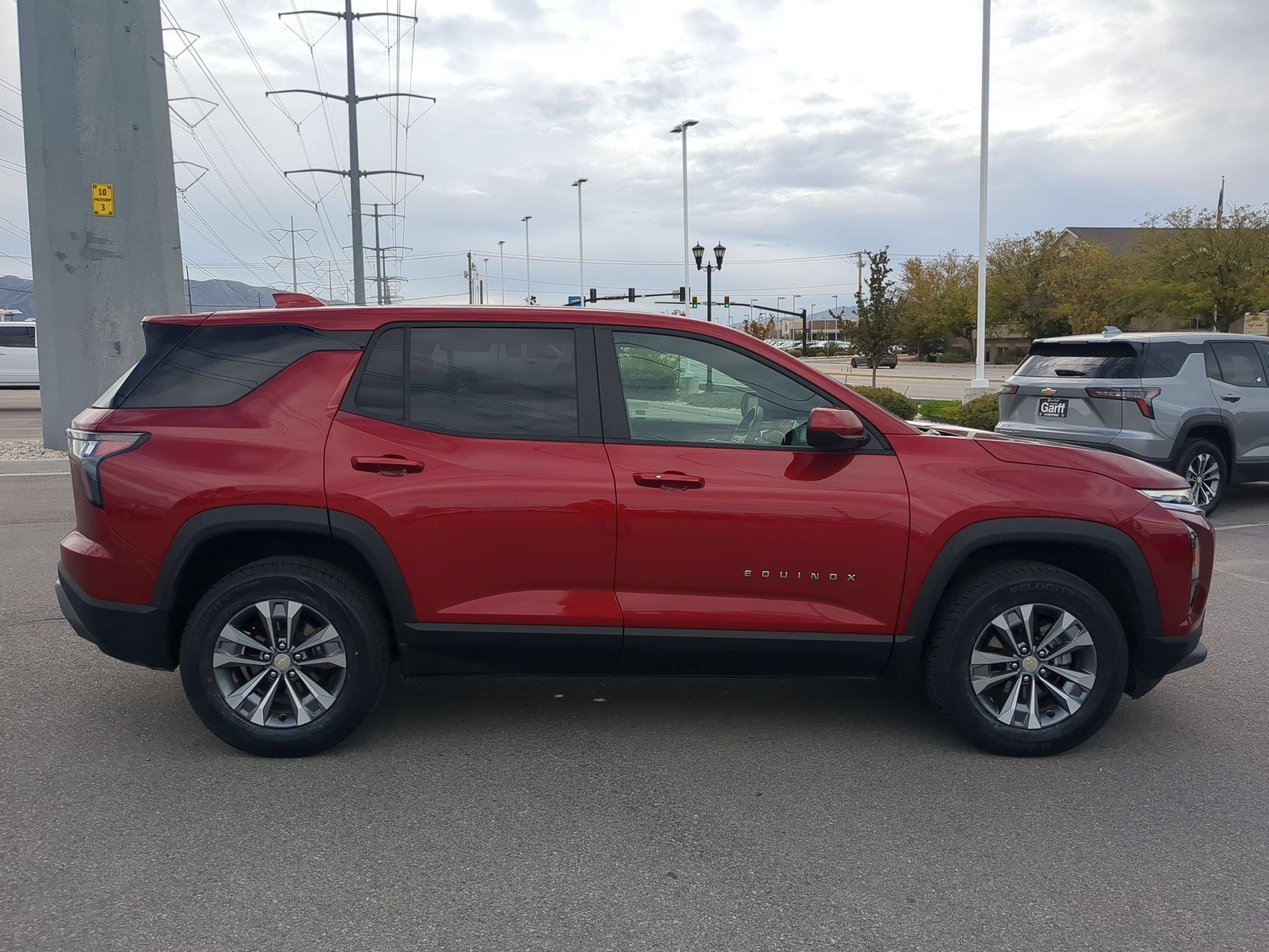 Used 2026 Radiant Red Tintcoat Chevrolet AWD LT image 2