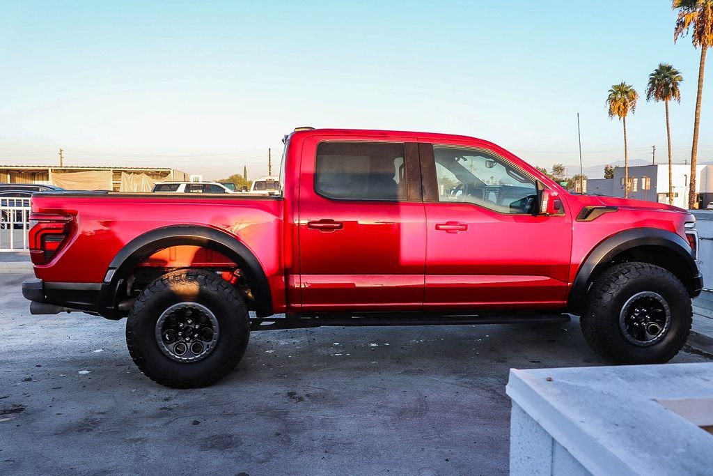 Used 2025 Red Metallic Ford Raptor image 13