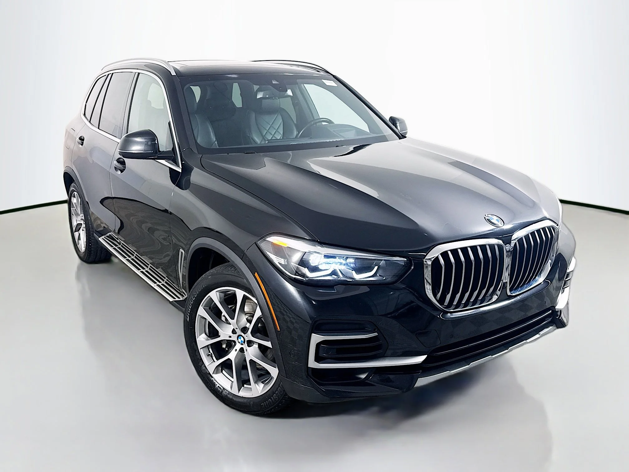 Used 2023 Black Sapphire Metallic BMW sDrive40i image 1