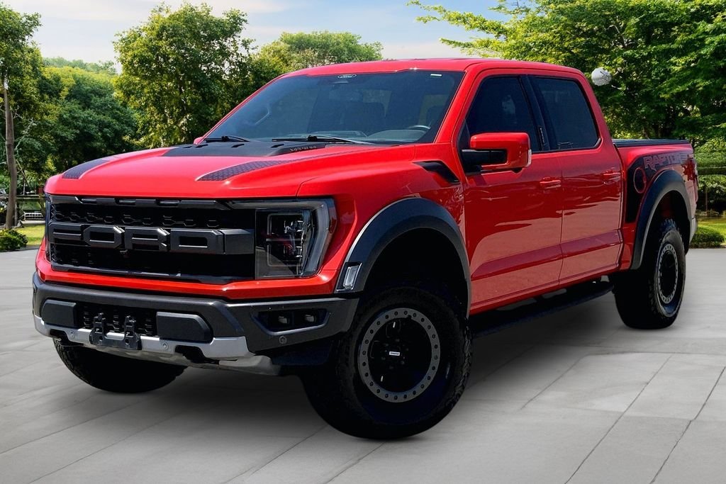 Used 2021 Orange Ford Raptor image 1