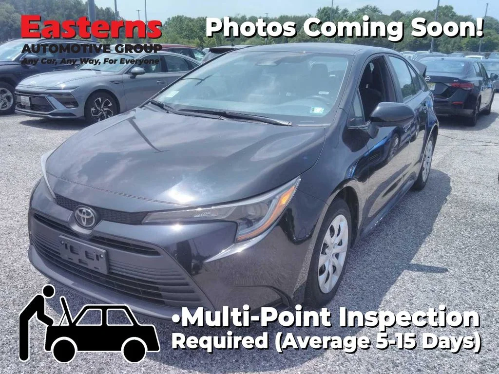 Used 2024 Black Toyota LE image 1