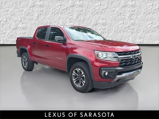 Used 2021 Cherry Red Tintcoat Chevrolet 4WD Z71 image 1