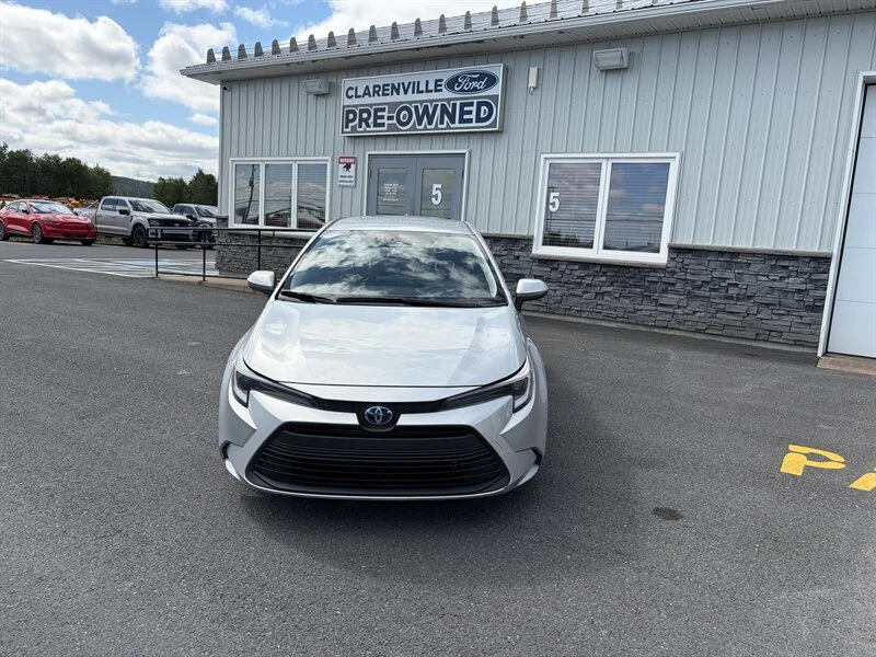 Used 2023 Silver Toyota LE image 1