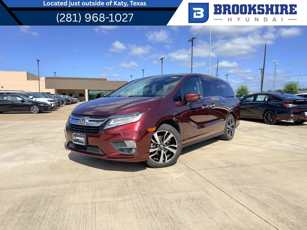 Used 2019 Deep Scarlet Pearl Honda Elite image 1