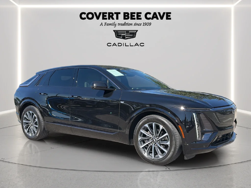 Used 2024 Stellar Black Metallic Cadillac Sport 1 image 1