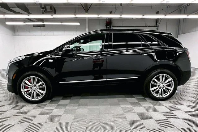 Used 2024 Stellar Black Metallic Cadillac Sport image 14