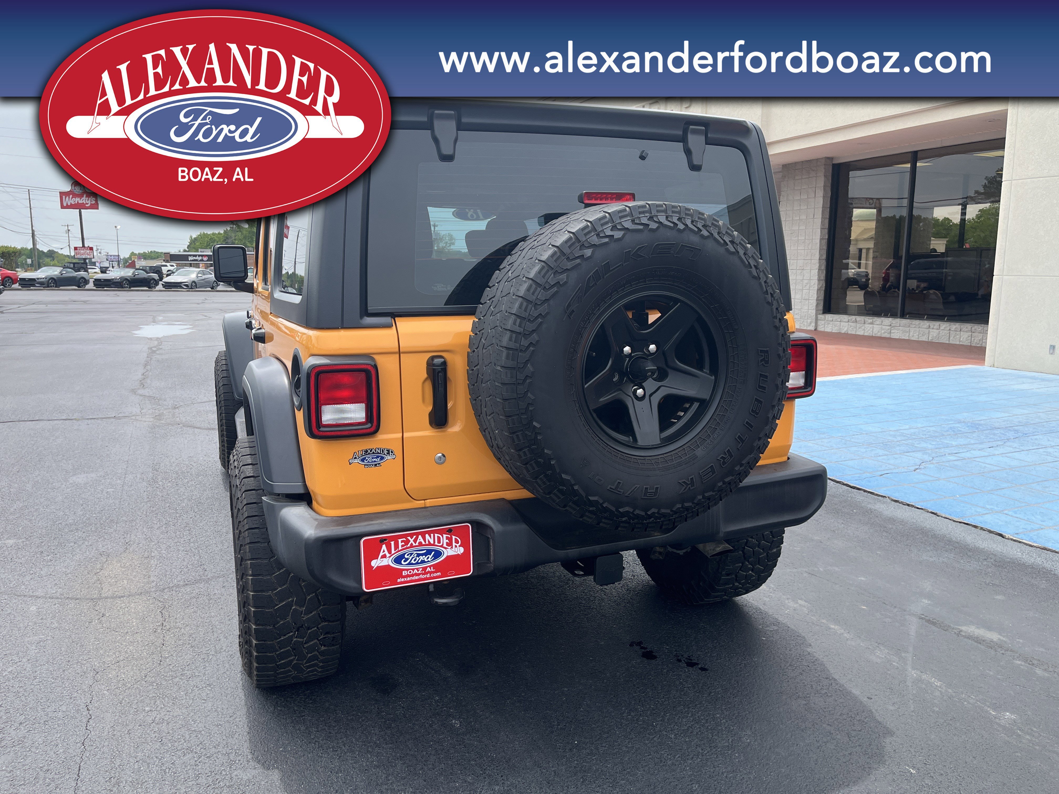 Used 2018 Orange Jeep Sport image 6