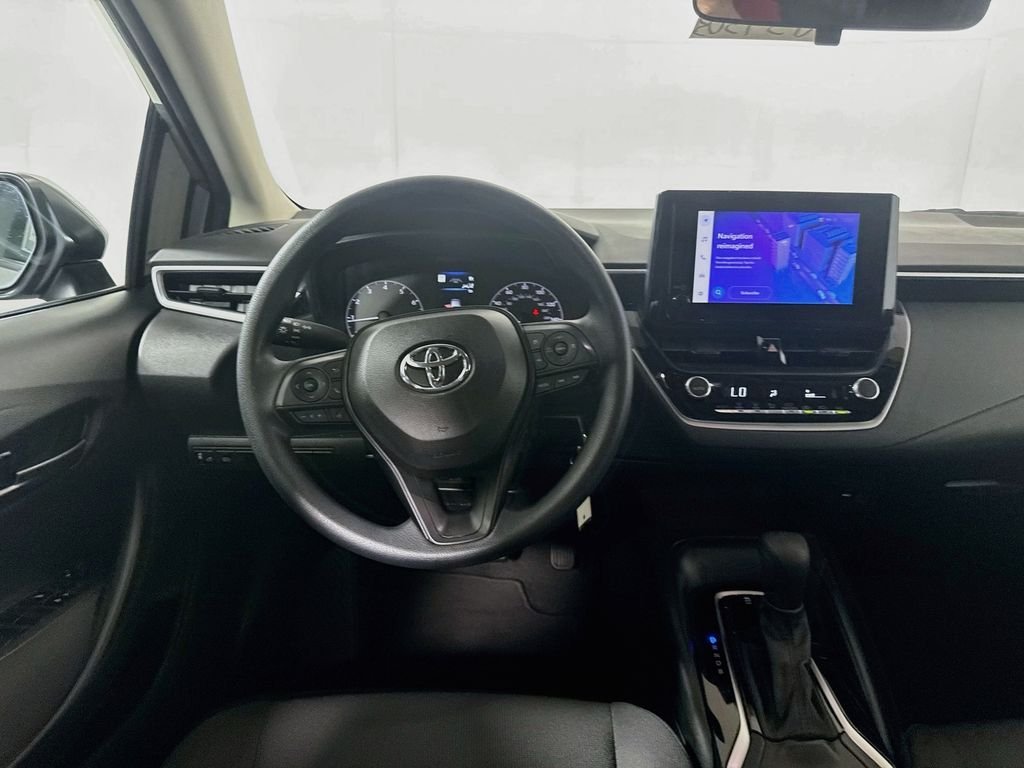 Used 2023 Classic Silver Metallic Toyota LE image 21