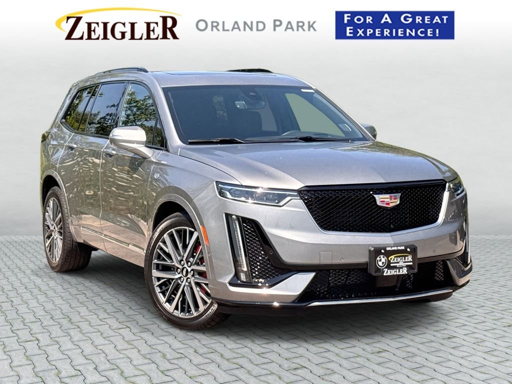 Used 2024 Silver Cadillac Sport image 1