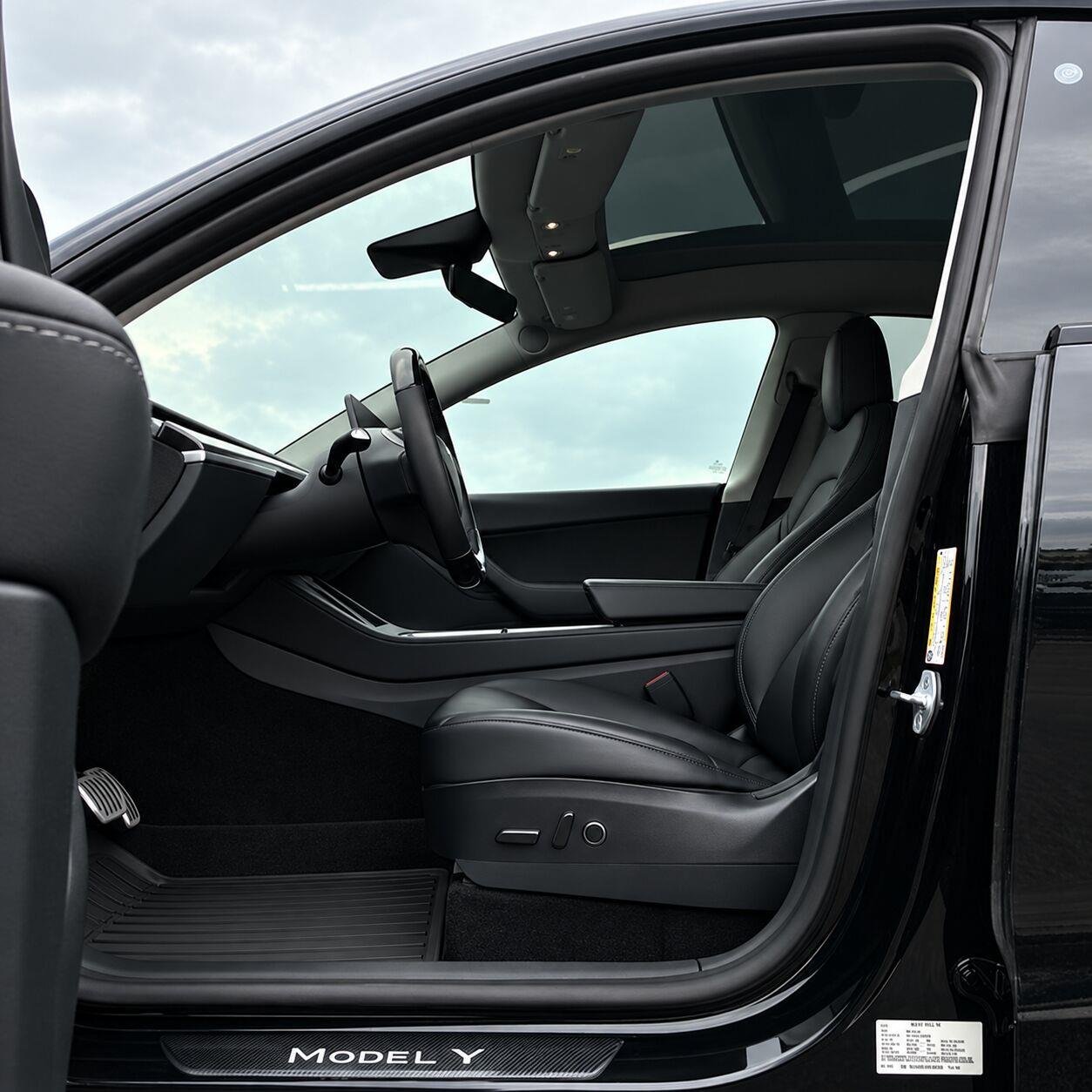 Used 2022 Solid Black Tesla Performance image 10