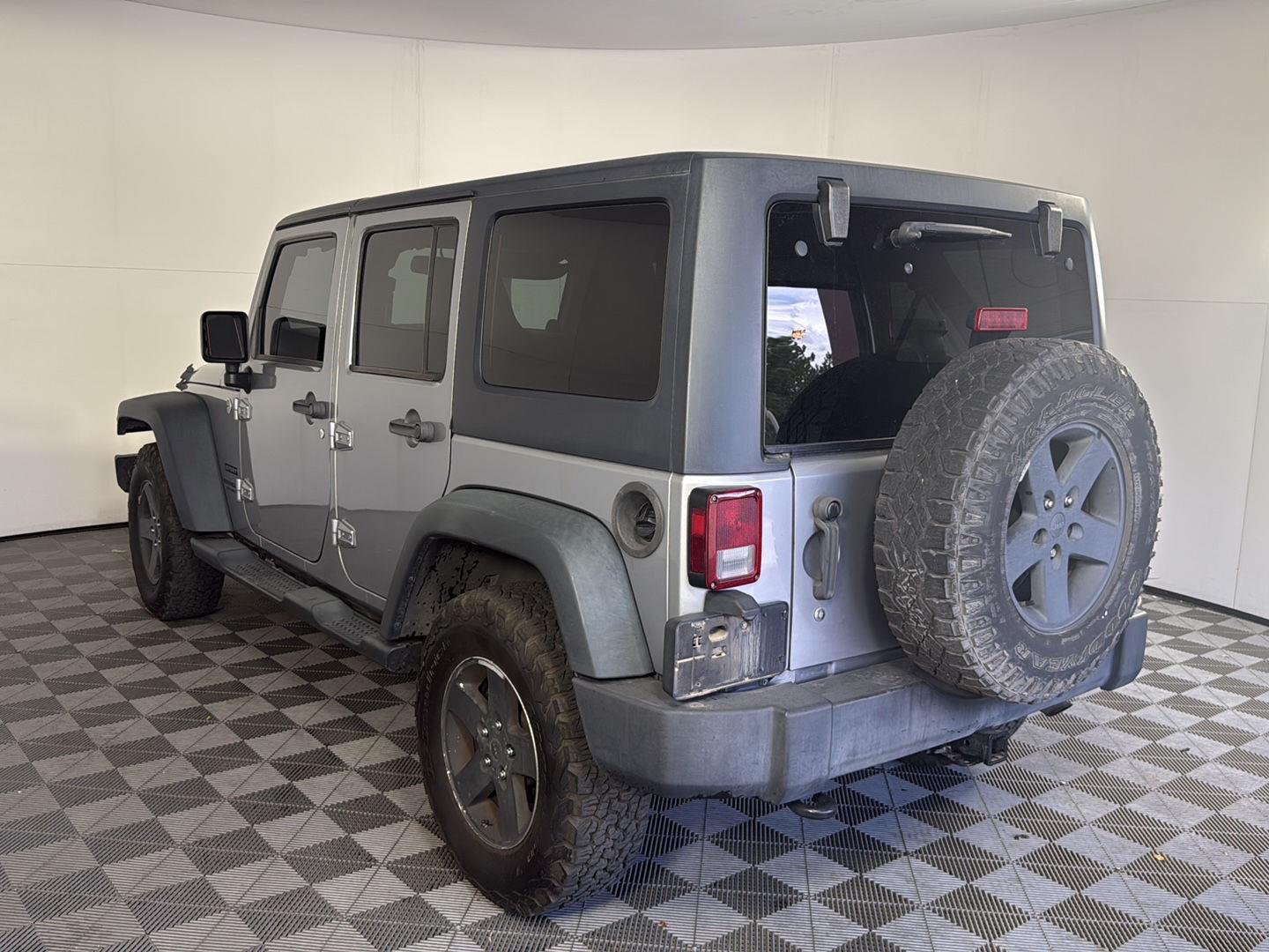 Used 2013 Billet Silver Metallic Jeep Sport image 6