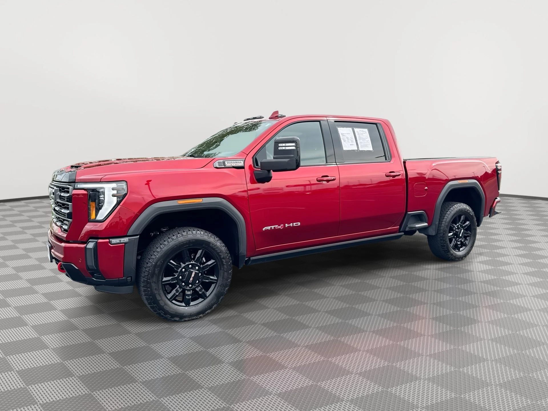 Used 2024 Volcanic Red Tintcoat GMC AT4 image 1