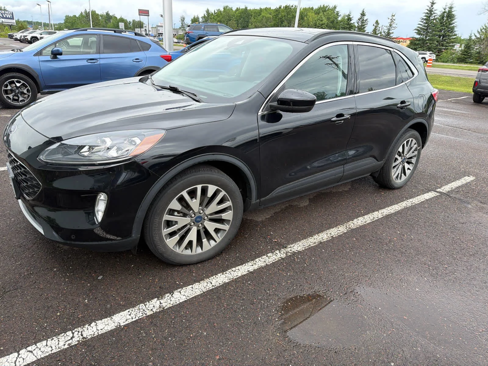 Used 2022 Agate Black Metallic Ford Titanium image 6