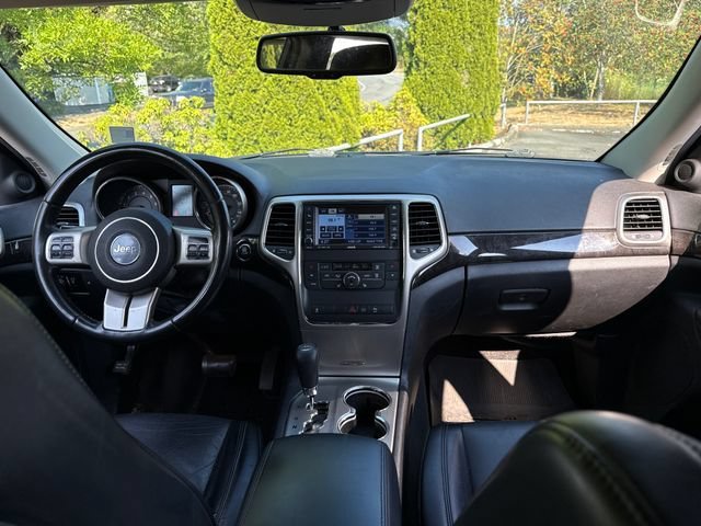 Used 2011 Blackberry Pearlcoat Jeep Laredo image 8