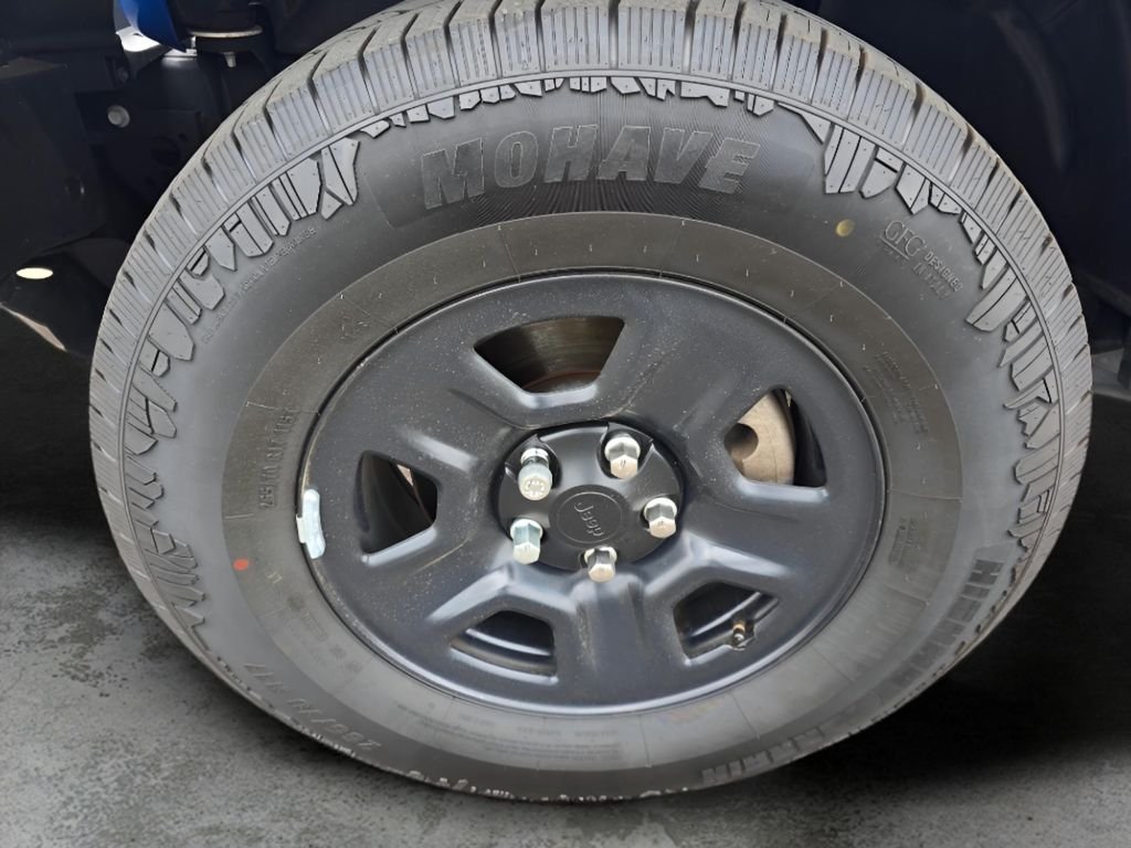 Used 2024 Hydro Blue Pearlcoat Jeep Sport image 28