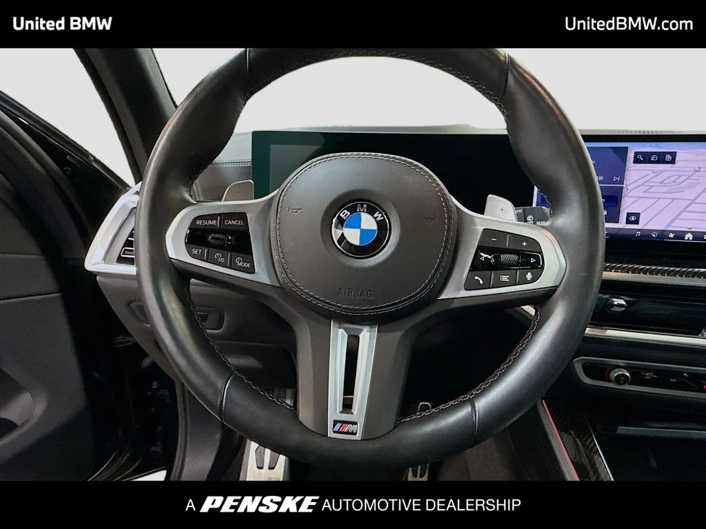 Certified Used 2026 Black Sapphire Metallic BMW M60i image 6