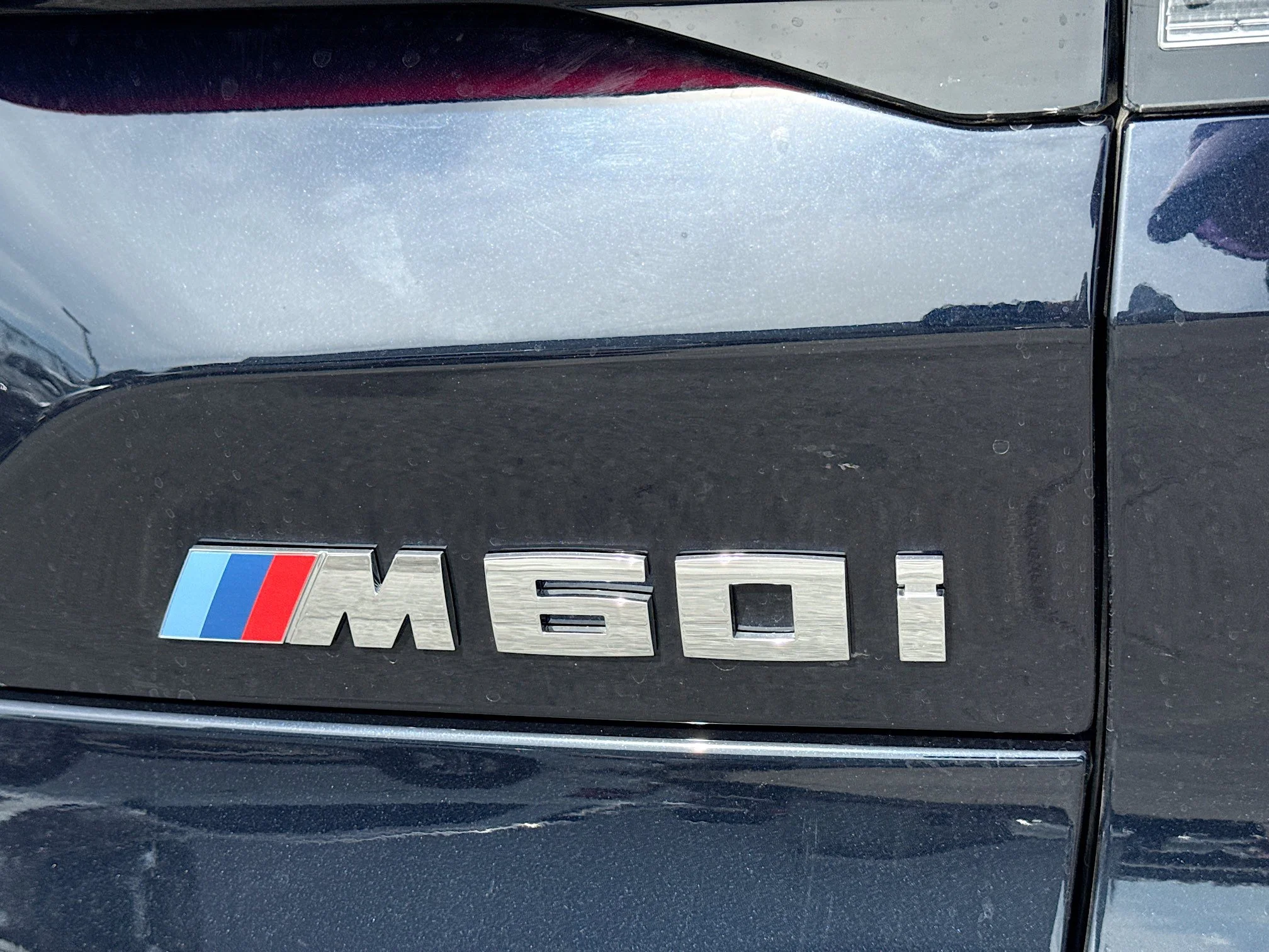 New 2026 Carbon Black Metallic BMW M60i image 10
