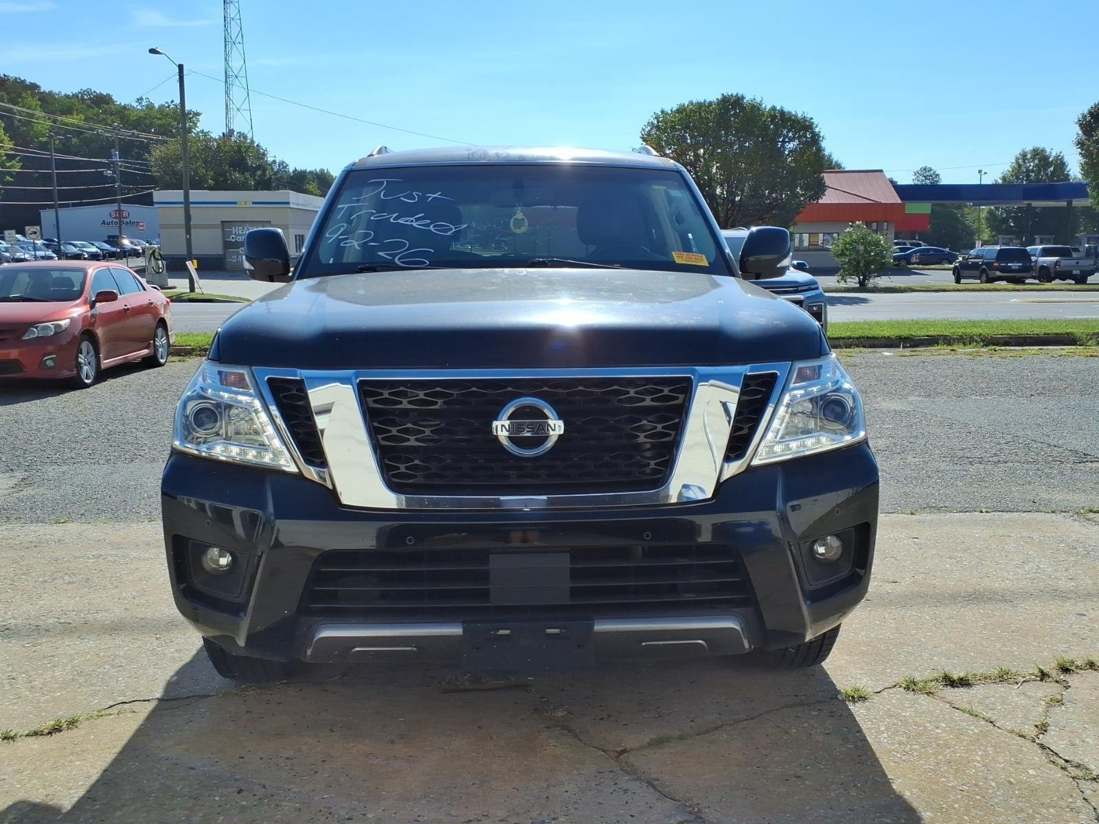 Used 2019 Super Black Nissan SV image 2