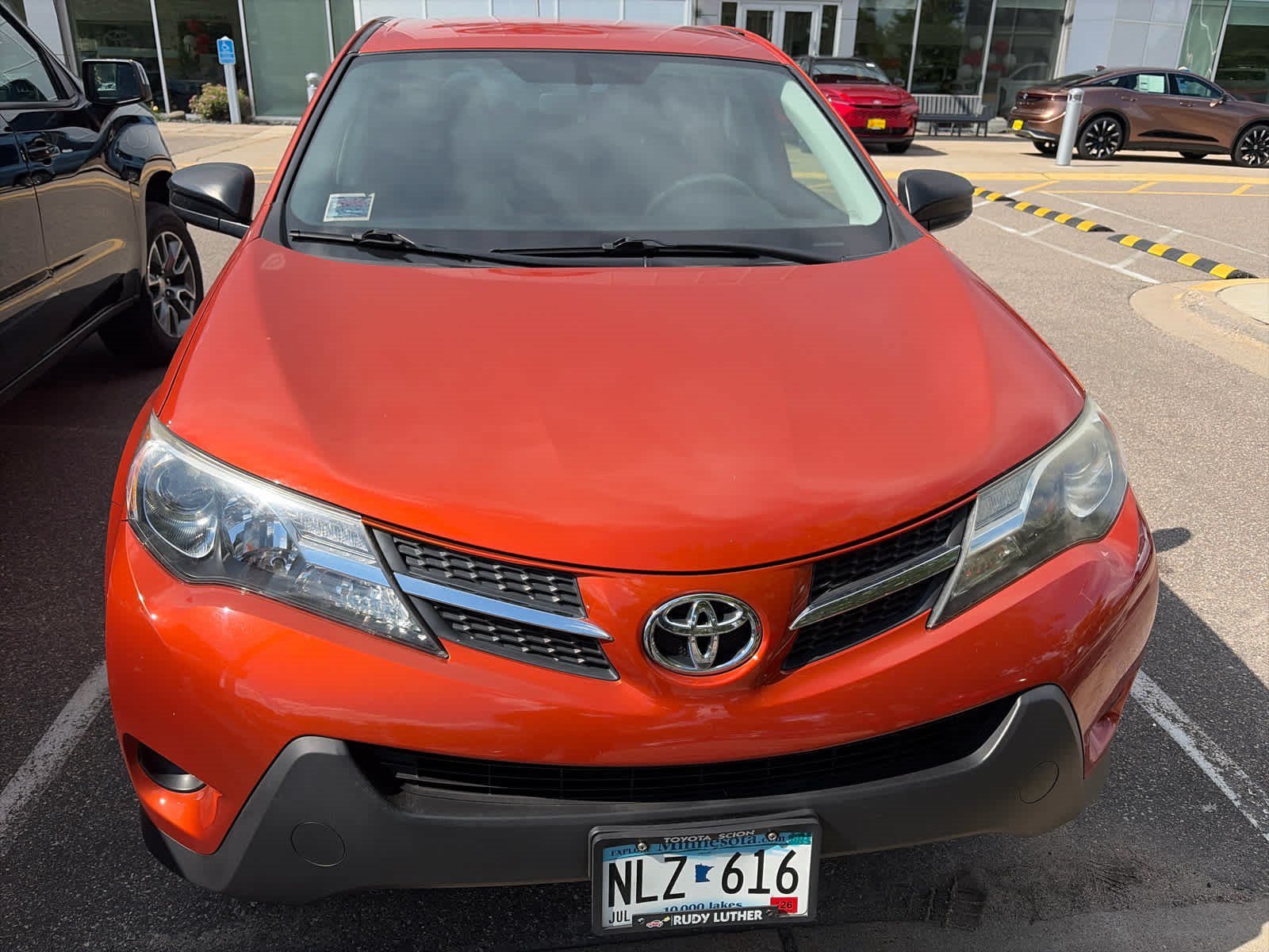 Used 2015 Hot Lava Toyota LE image 2